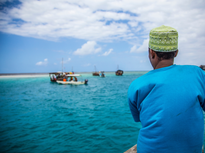 Traditional dhow boats sailing in the turquoise waters of Zanzibar, Tanzania