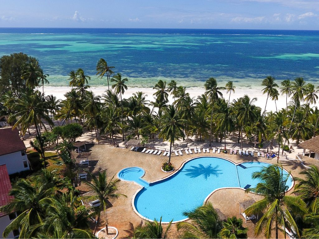 VOI Kiwengwa Resort Zanzibar pool surrounded by palm trees